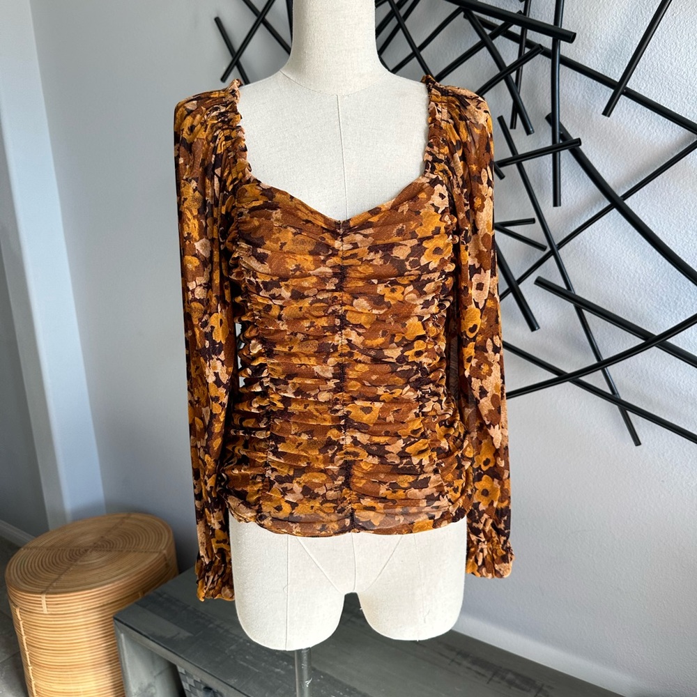 Shirred, long sleeve, square-neck top.